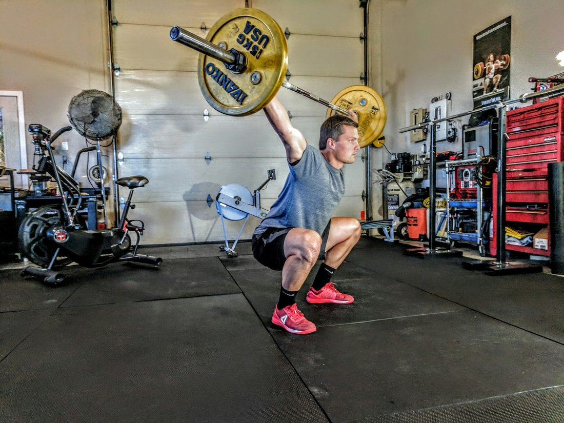 Athlete training with a barbell
